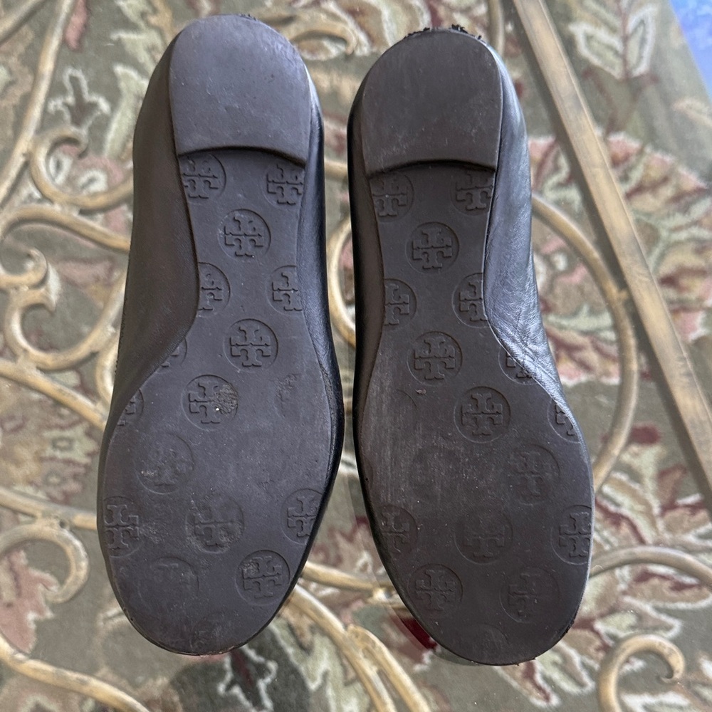 Tory Burch Gorgeous Black Flats with Gold Emblem - Picture 6 of 7